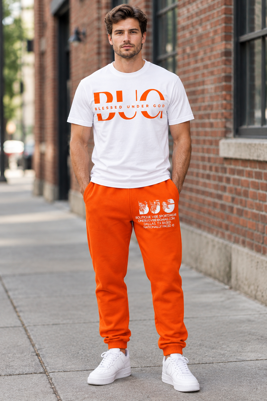 White male model wearing orange and white BUG outfit